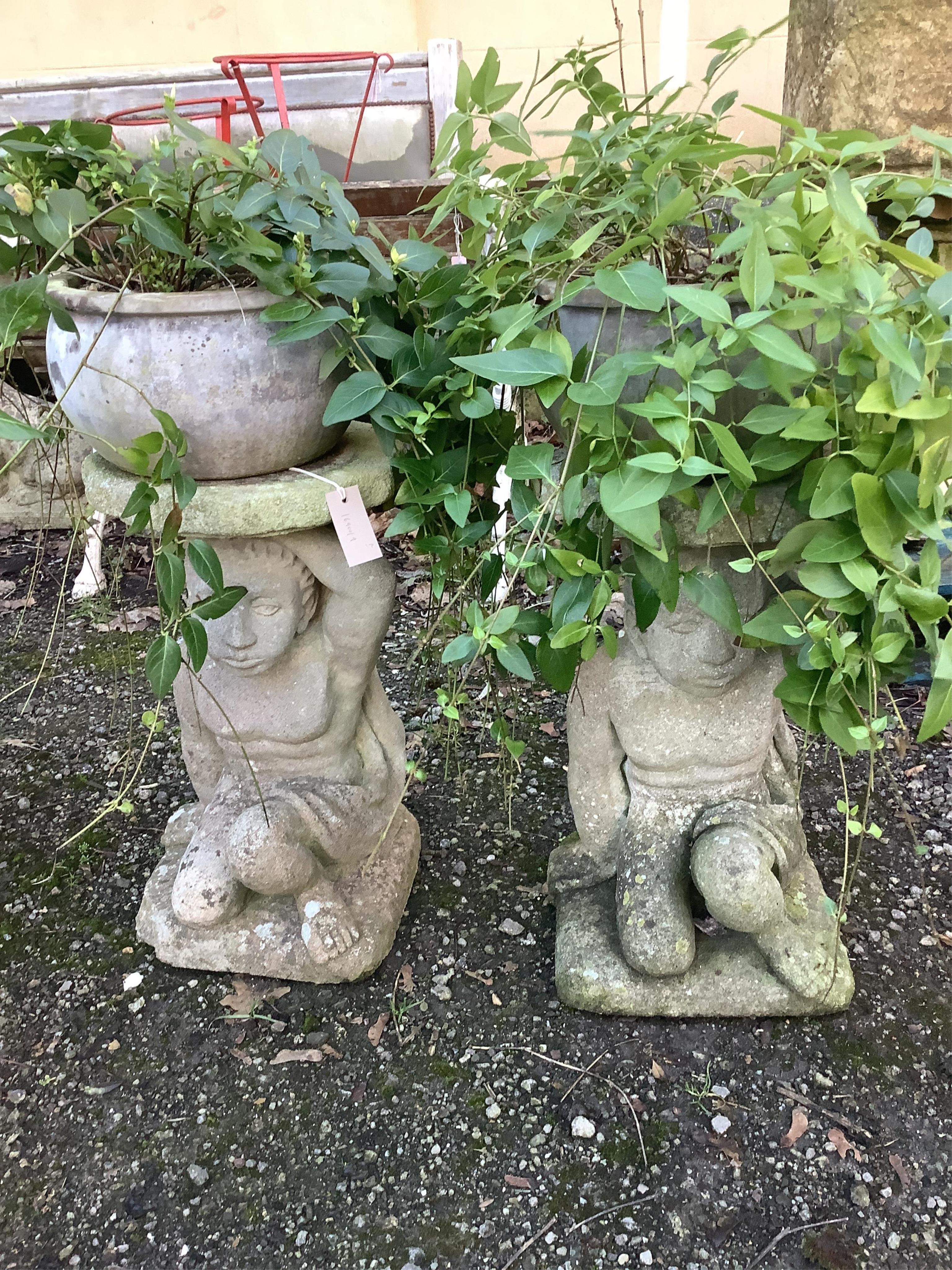 A pair of earthenware garden planters on reconstituted stone figural bases, height 72cm. Condition - fair